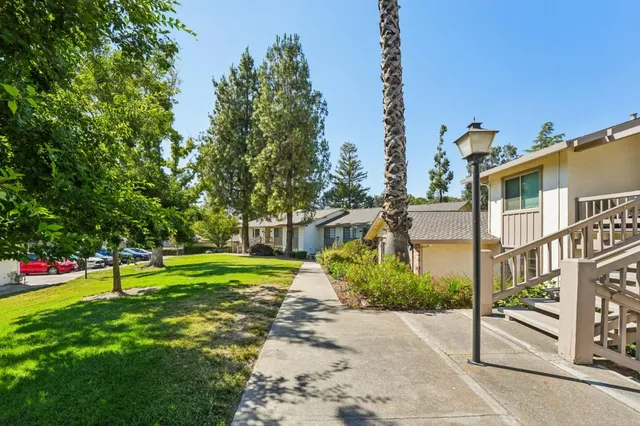 an aerial view of a house with a garden