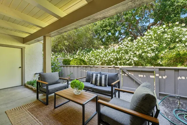 a view of a two chairs in the roof deck
