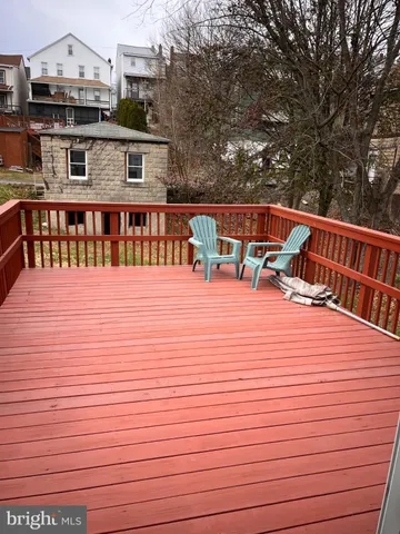 a view of balcony with a deck