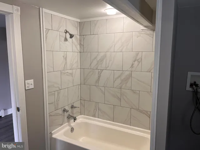 a bathroom with a bathtub