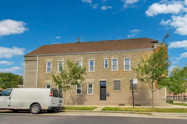 a car parked in front of a house