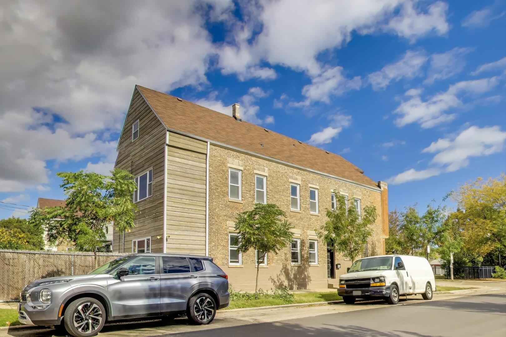 3558 South Honore Street Chicago, IL 60609 - Photo 3 of 37 a car parked in front of a house