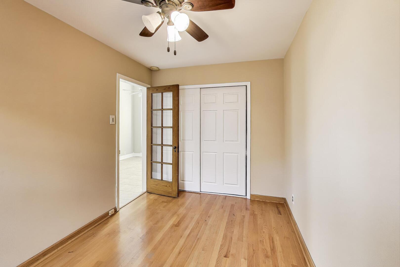 3558 South Honore Street Chicago, IL 60609 - Photo 33 of 37 wooden floor in an empty room with a window