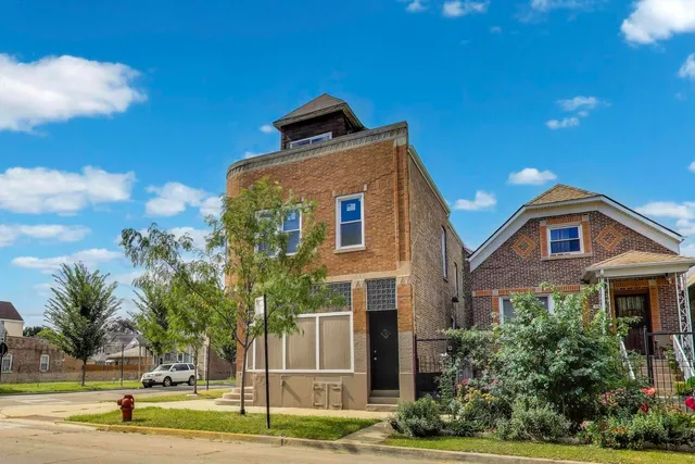 a kitchen with sink stove and cabinets