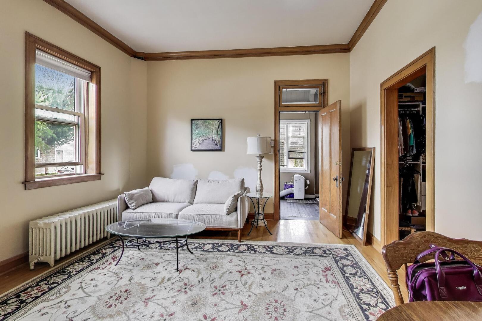 3558 South Honore Street Chicago, IL 60609 - Photo 9 of 37 a living room with furniture and a window