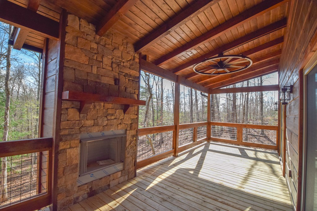 375 Ridge Brook Drive Morganton, GA 30560 - Photo 16 of 34 a view of a porch with wooden floor and city view