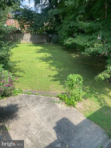 a garden view with a seating space