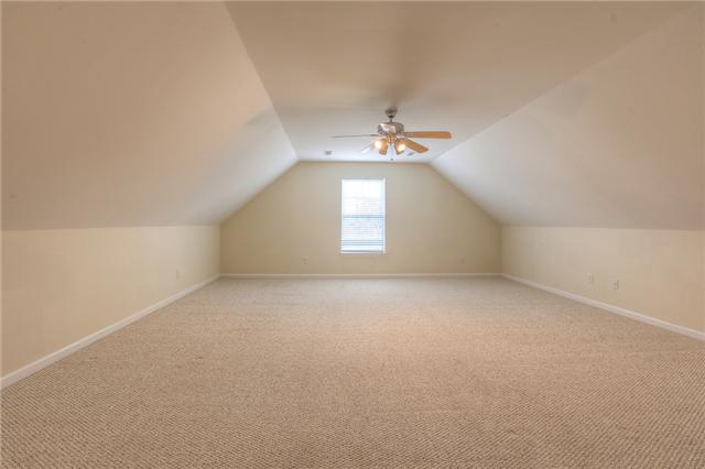 2022 Patrick Way Spring Hill, TN 37174 - Photo 12 of 14 LARGE BONUS ROOM ABOVE GARAGE WITH VAULTED CEILINGS
