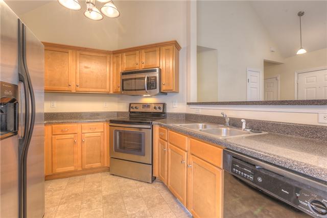 2022 Patrick Way Spring Hill, TN 37174 - Photo 6 of 14 STAINLESS STEEL APPLIANCES, ALL STAY (INCLUDING THE SIDE-BY-SIDE REFRIGERATOR)
