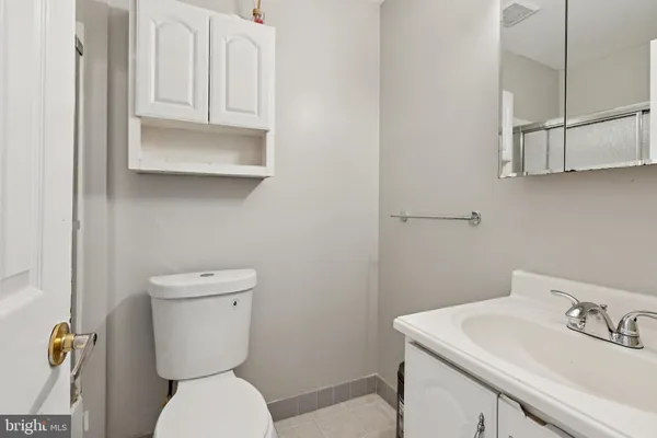 a view of an empty room with stairs