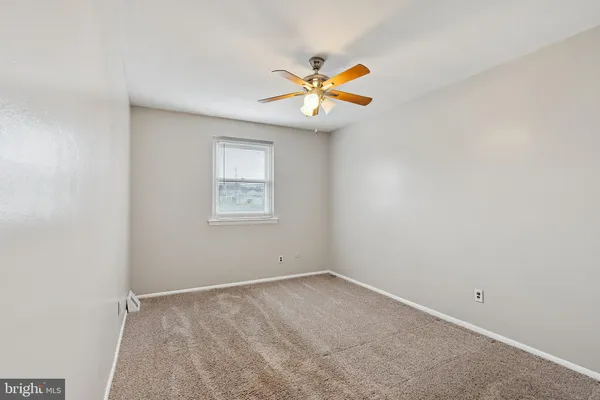 a view of storage and utility room with washer and dryer