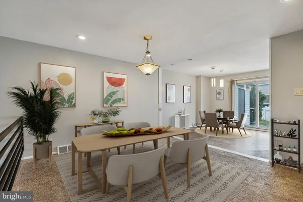 a large kitchen with stainless steel appliances a refrigerator and a sink