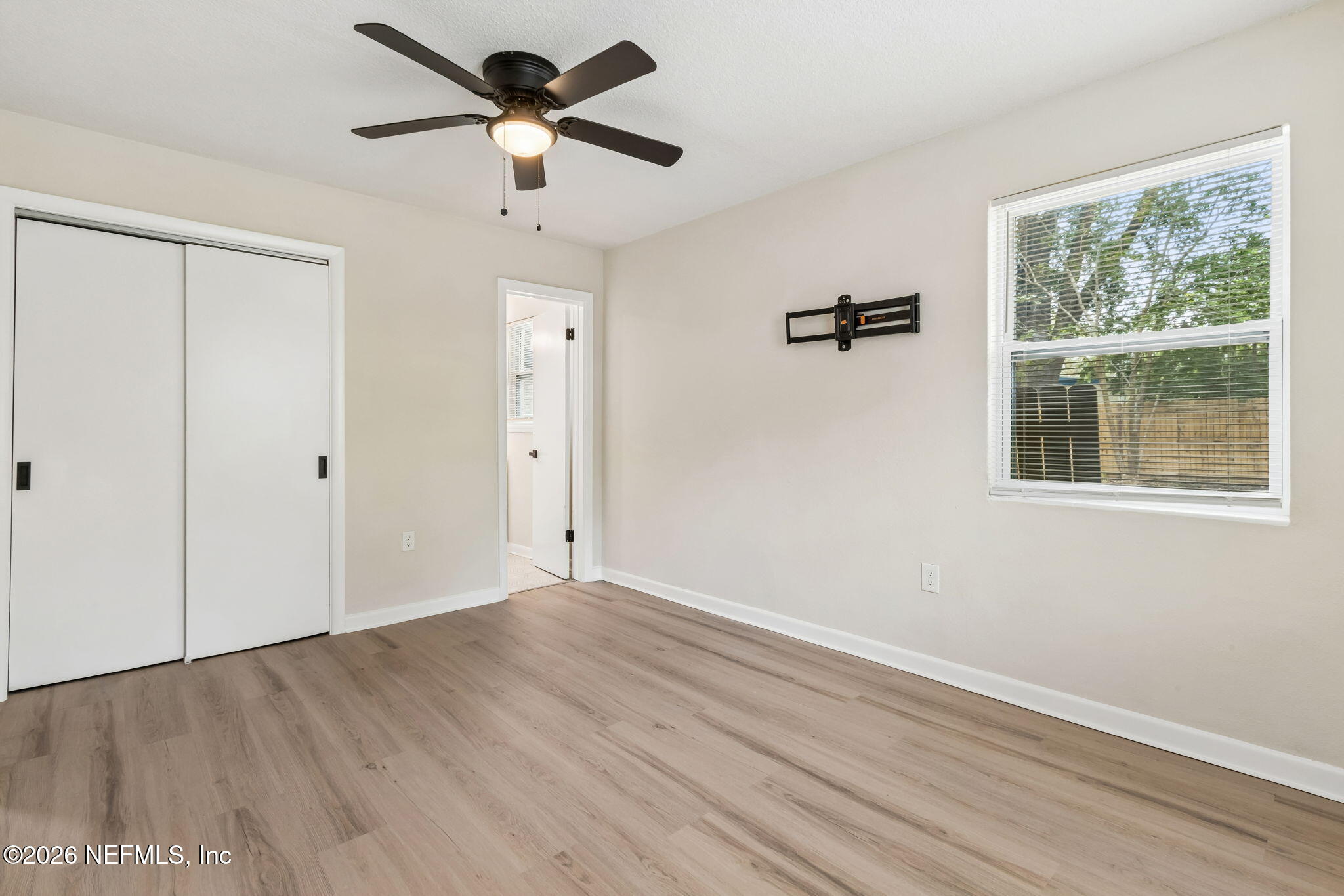 3668 Marianna Road Jacksonville, FL 32217 - Photo 16 of 28 a view of a livingroom with a ceiling fan and window