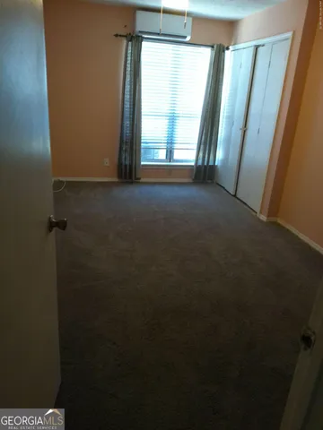 a view of a room that has a window in it