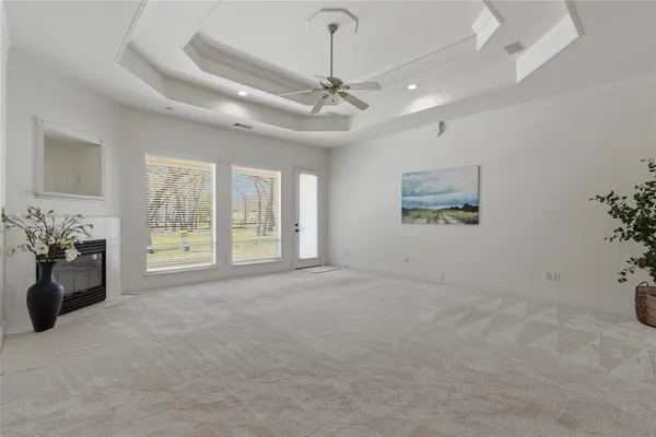 a spacious bathroom with a double vanity sink mirror and a bathtub