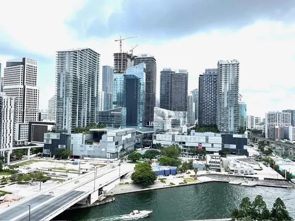 a view of a city with tall buildings