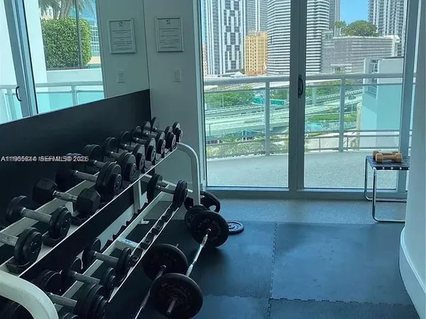 a swimming pool with outdoor seating and yard