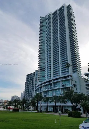 a view of a city with tall buildings