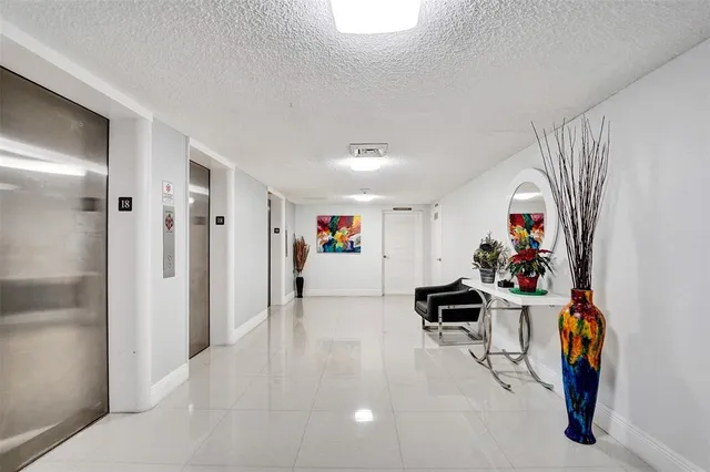 a hallway with windows