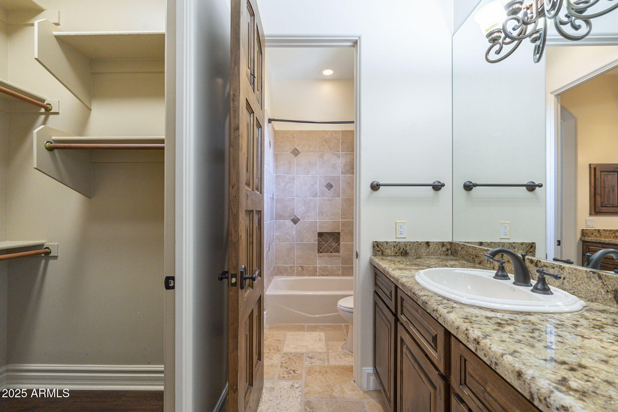 15135 East Monument Road Scottsdale, AZ 85262 - Photo 27 of 65 a bathroom with a granite countertop sink and a mirror