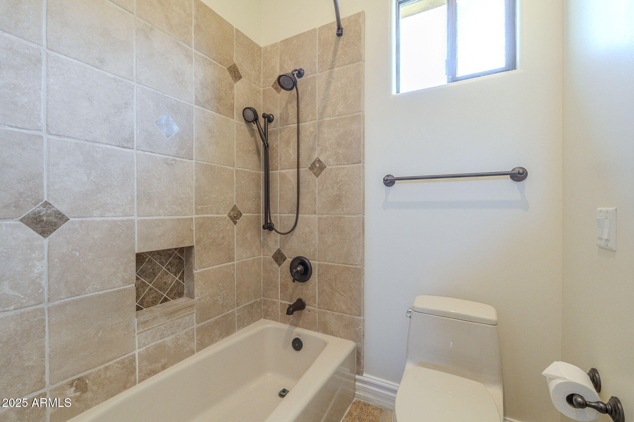15135 East Monument Road Scottsdale, AZ 85262 - Photo 28 of 65 a bathroom with a bathtub and a toilet