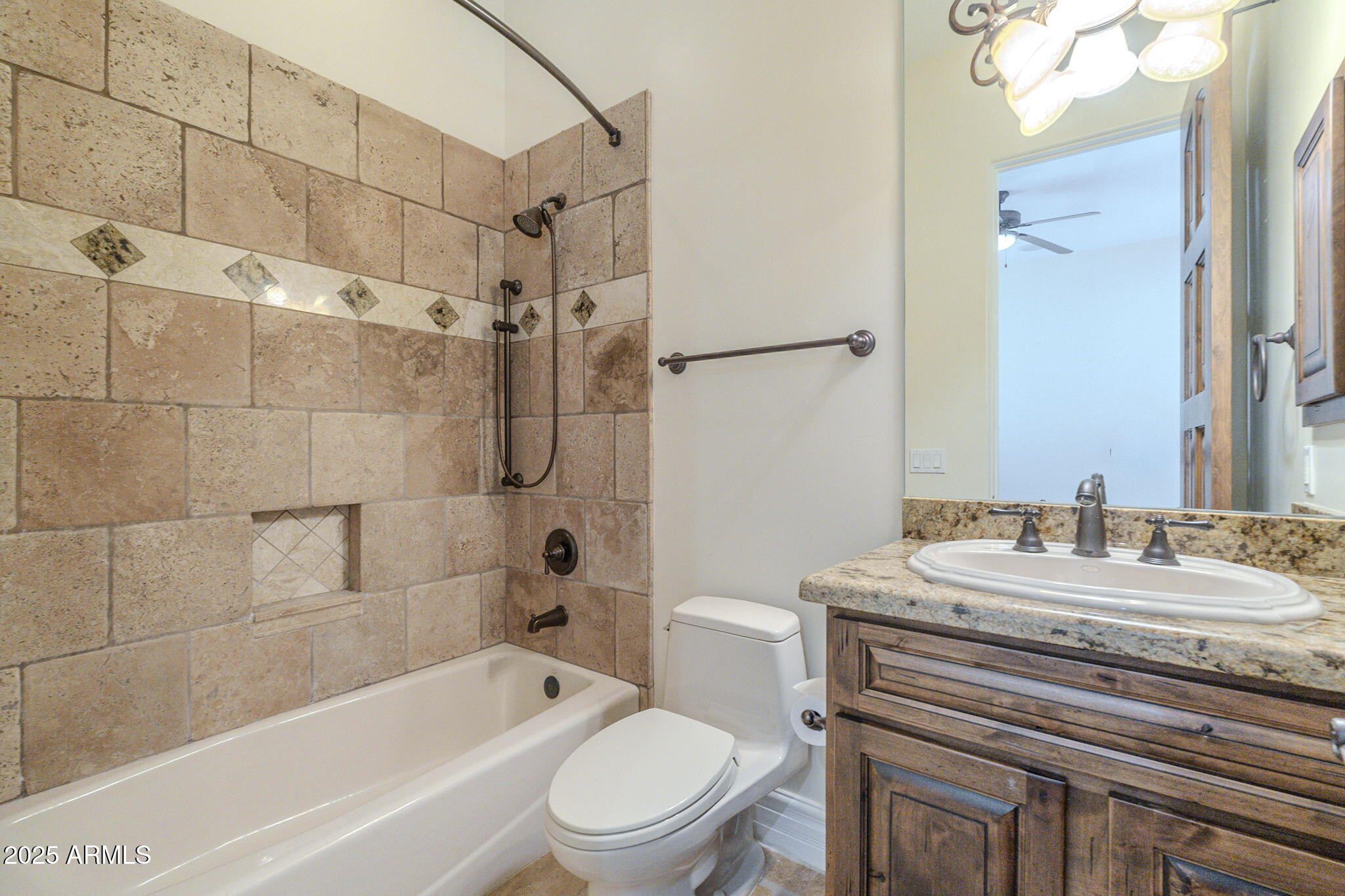 15135 East Monument Road Scottsdale, AZ 85262 - Photo 33 of 65 a bathroom with a sink a toilet and shower