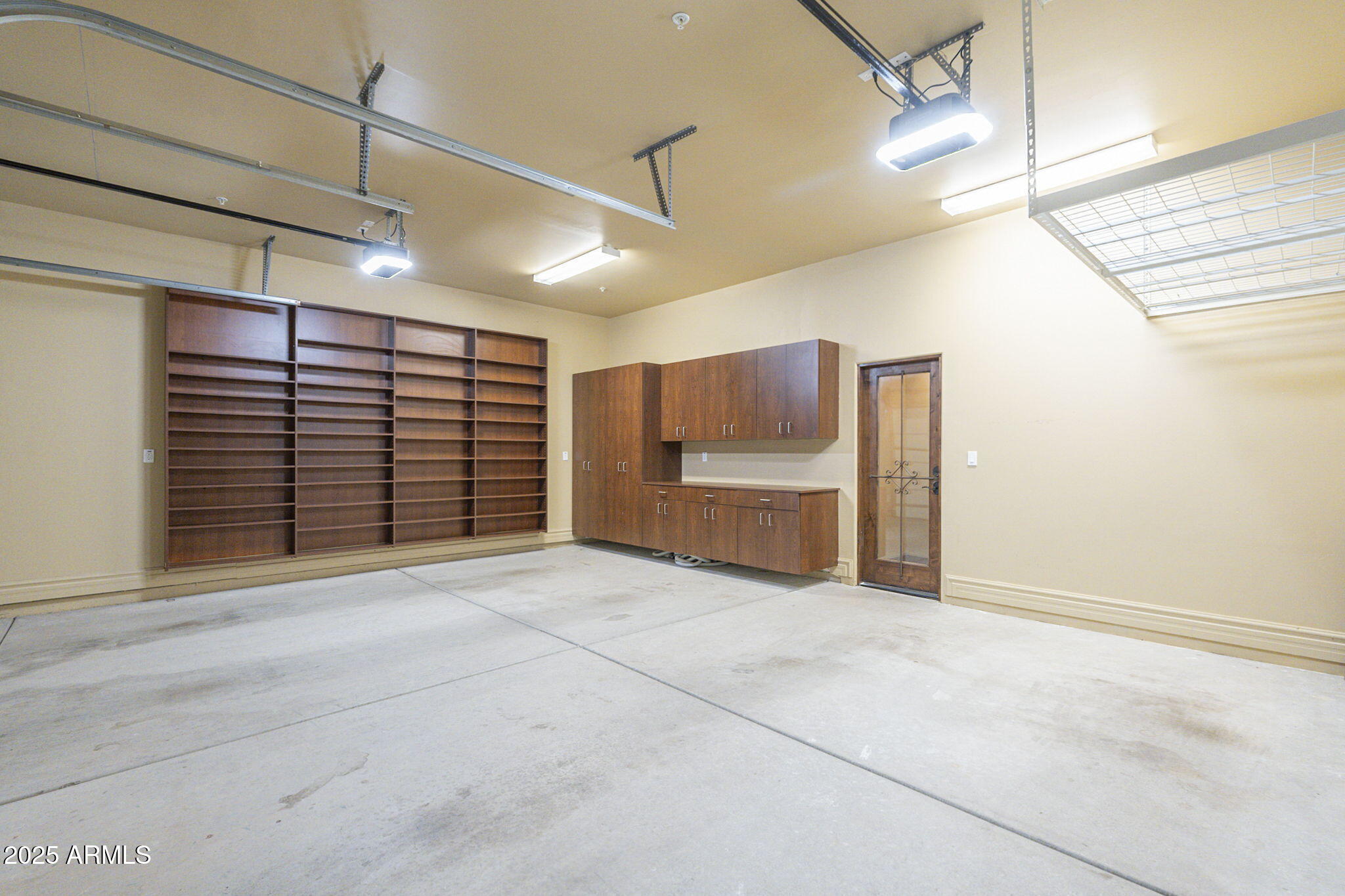 15135 East Monument Road Scottsdale, AZ 85262 - Photo 40 of 65 a view of an empty room with a window and brick walls