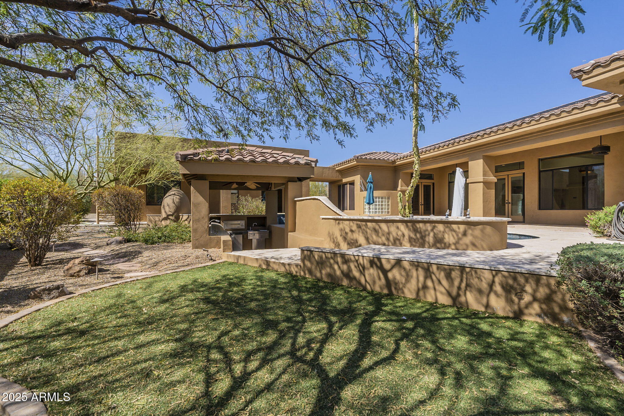 15135 East Monument Road Scottsdale, AZ 85262 - Photo 53 of 65 a view of a house with a patio