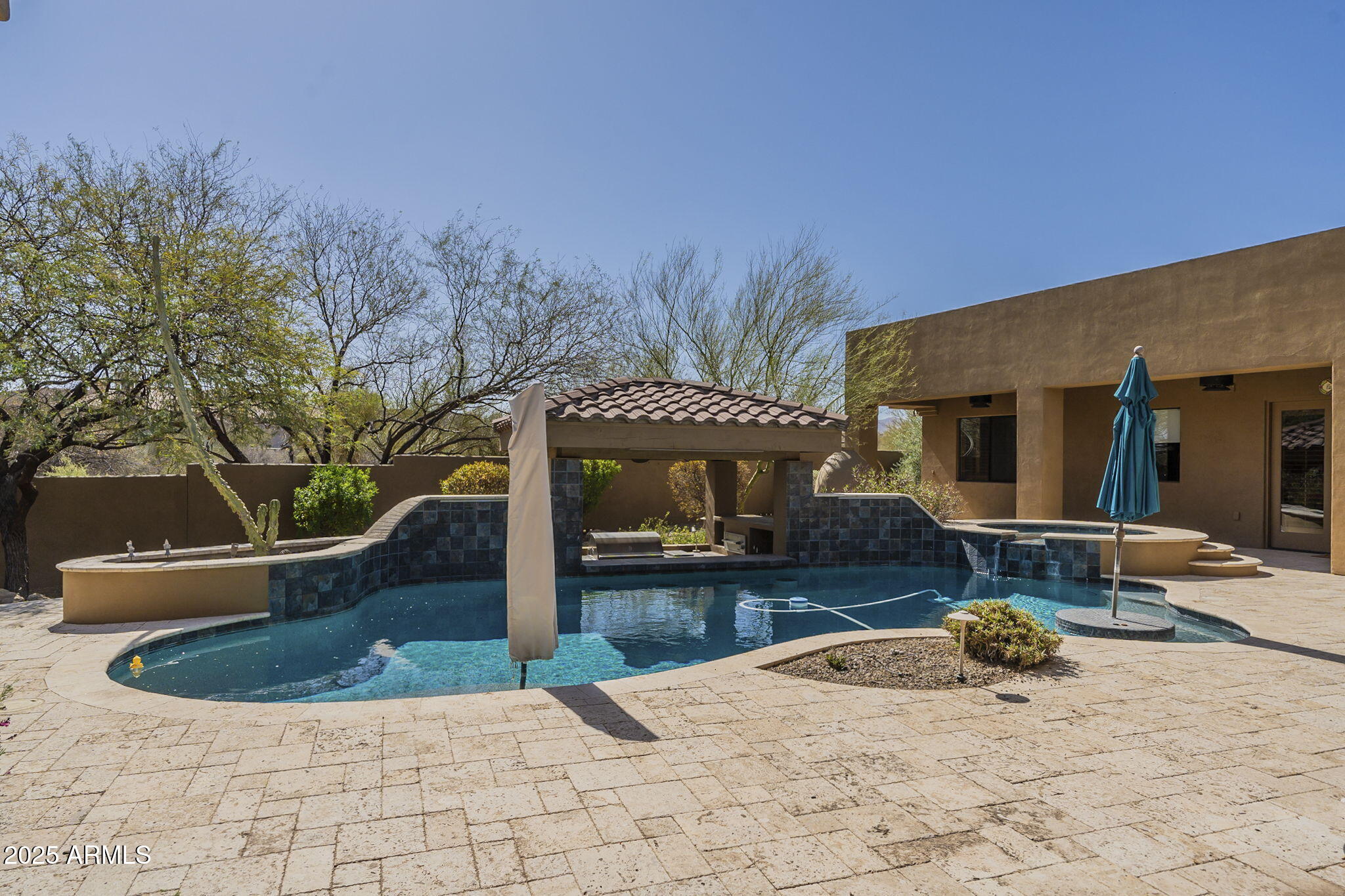 15135 East Monument Road Scottsdale, AZ 85262 - Photo 56 of 65 a view of a house with backyard and sitting area