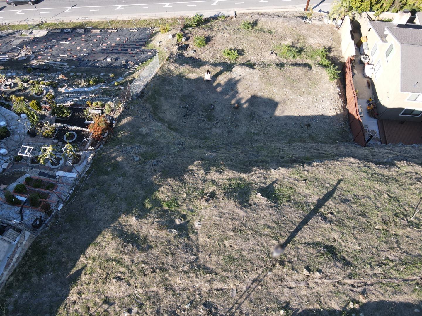 150 Senter Road San Jose, CA 95111 - Photo 4 of 5 a view of a yard with wooden fence