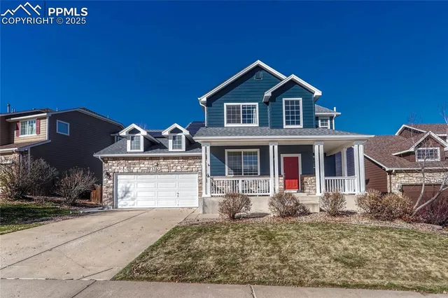 a open kitchen with stainless steel appliances granite countertop a stove and a wooden floors