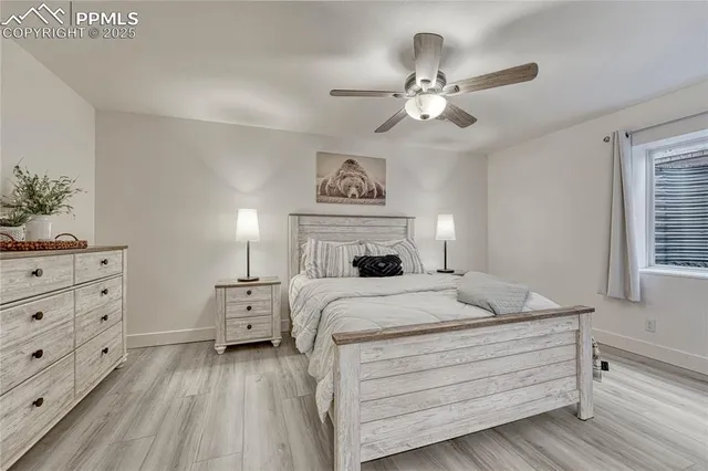 a front view of a house with a yard table and chairs