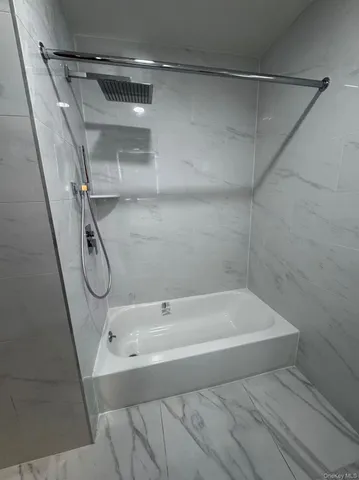 a bathroom with a bathtub