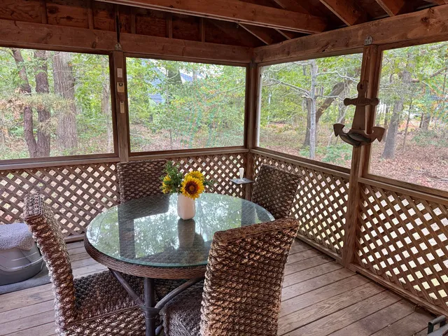 a view of a porch with furniture