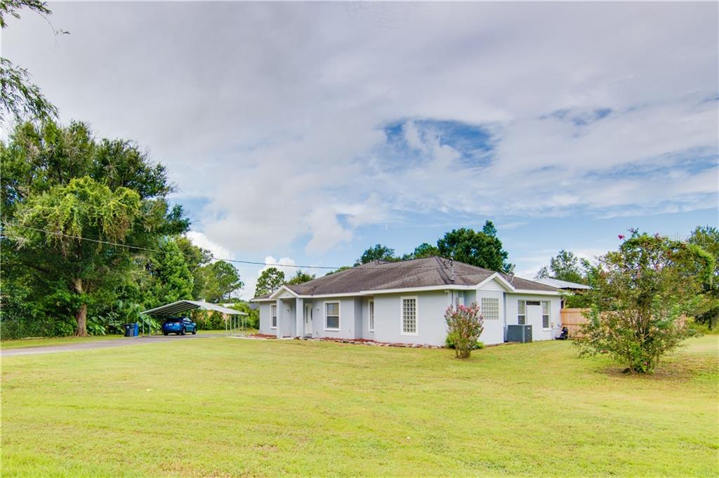 207 Dennison Road Lutz, FL 33549 - Photo 1 of 1 Exterior Front