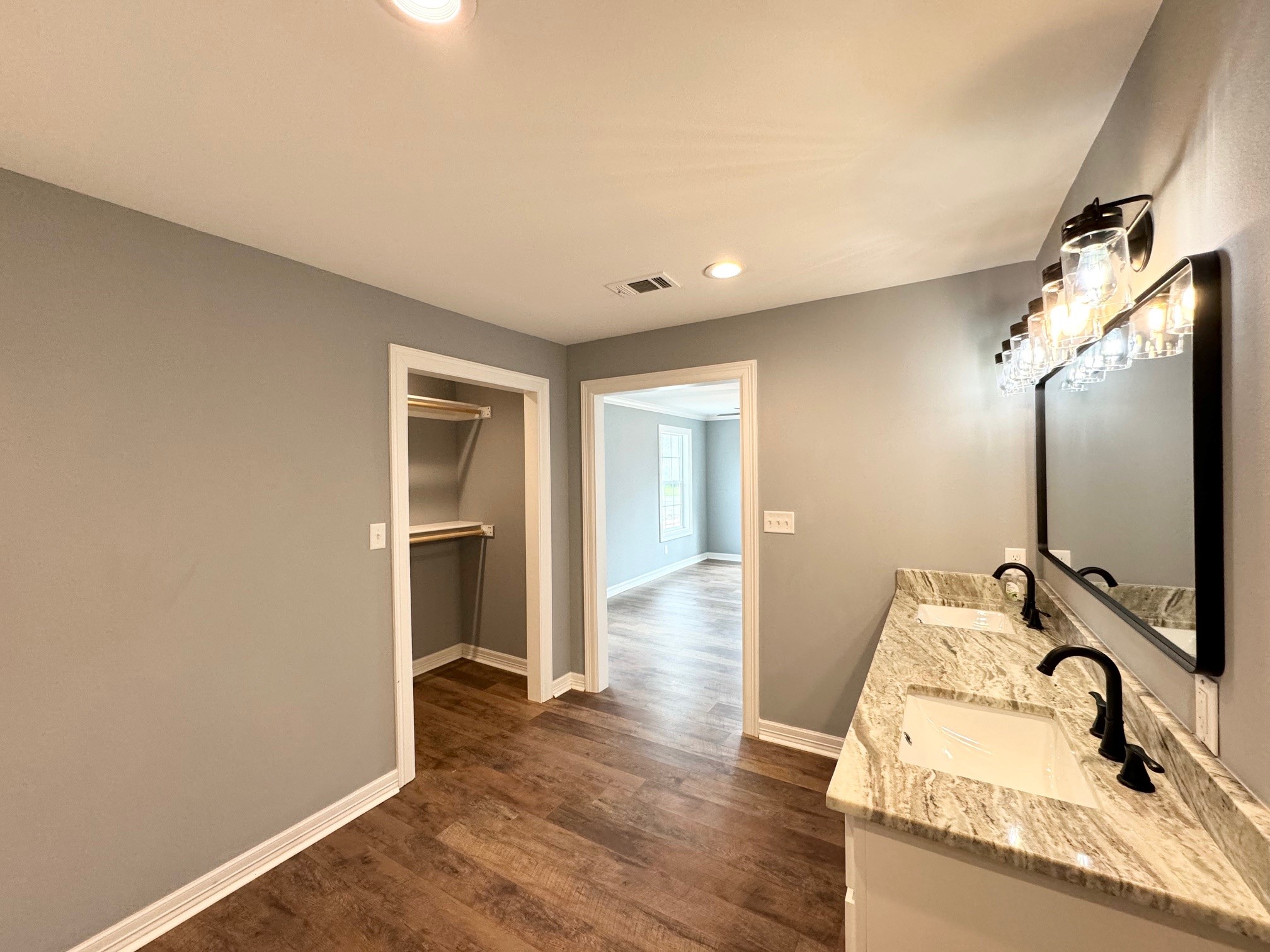 409 South 9th Street Crockett, TX 75835 - Photo 12 of 19 a bathroom with a sink and a mirror