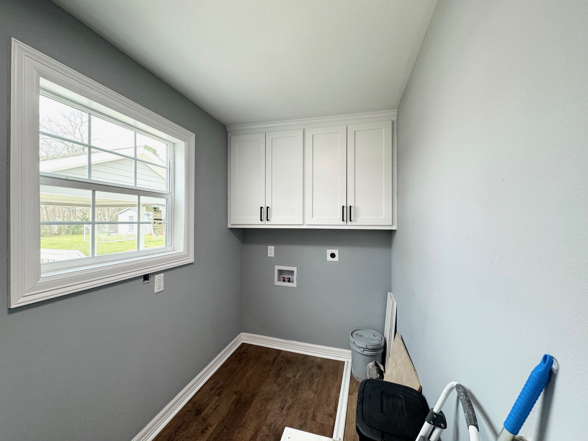 409 South 9th Street Crockett, TX 75835 - Photo 17 of 19 a room with cabinets and a window
