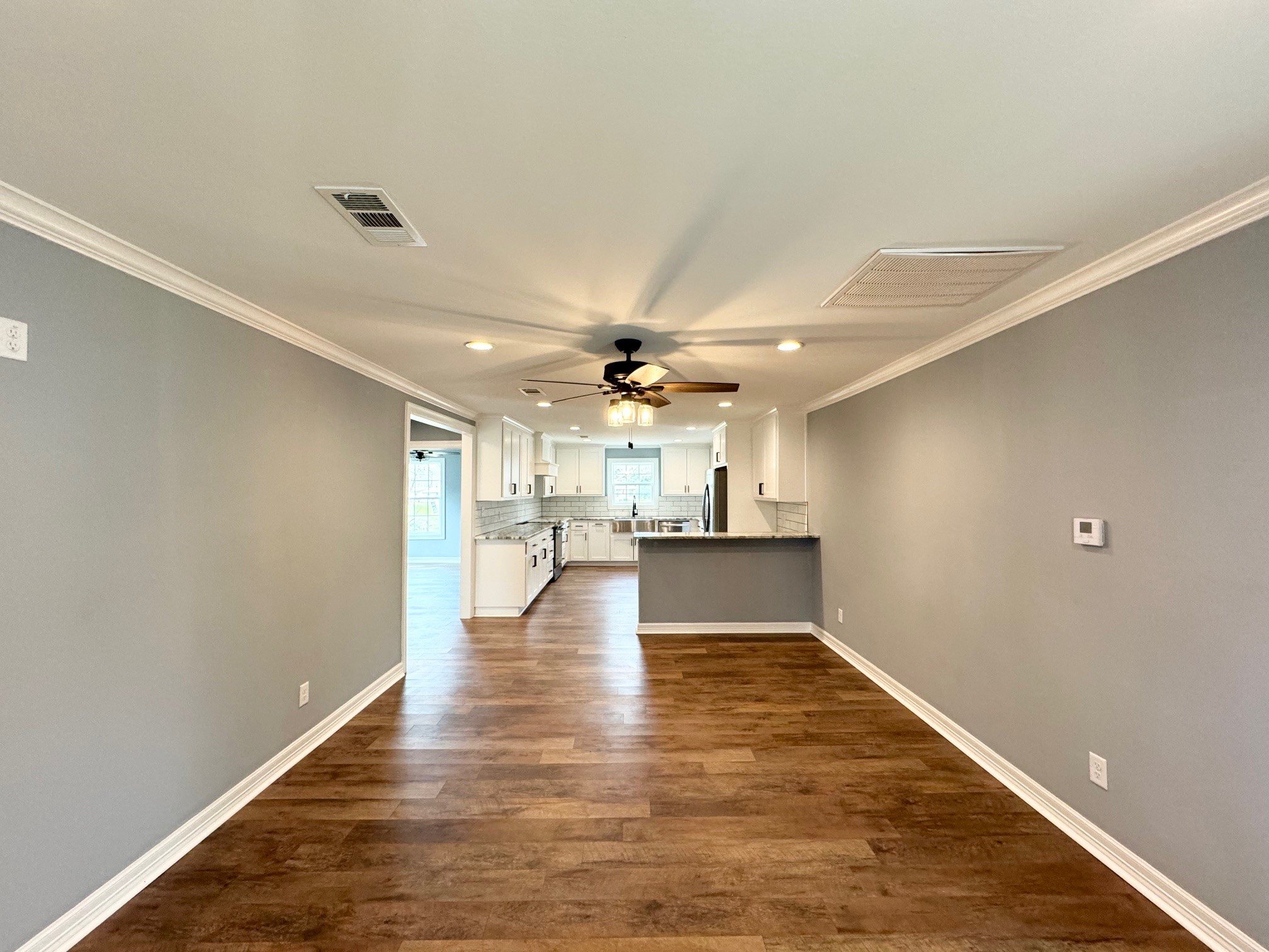 409 South 9th Street Crockett, TX 75835 - Photo 9 of 19 a view of a kitchen and a window