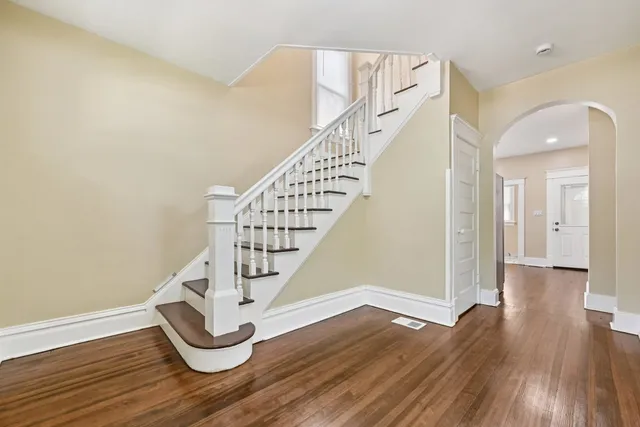 a view of entryway with wooden floor