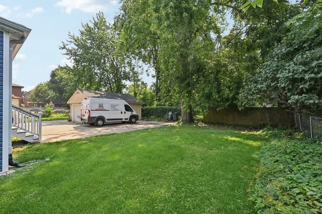 a house with trees in the background