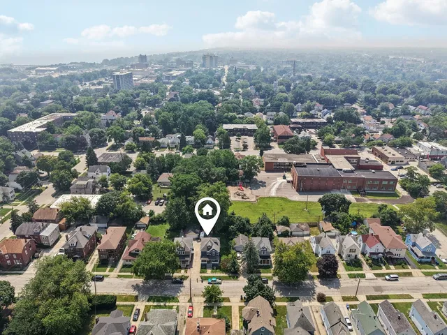 an aerial view of a city with lots of residential buildings
