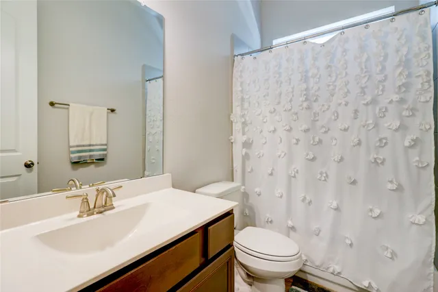 a view of a city with swimming pool and lake view