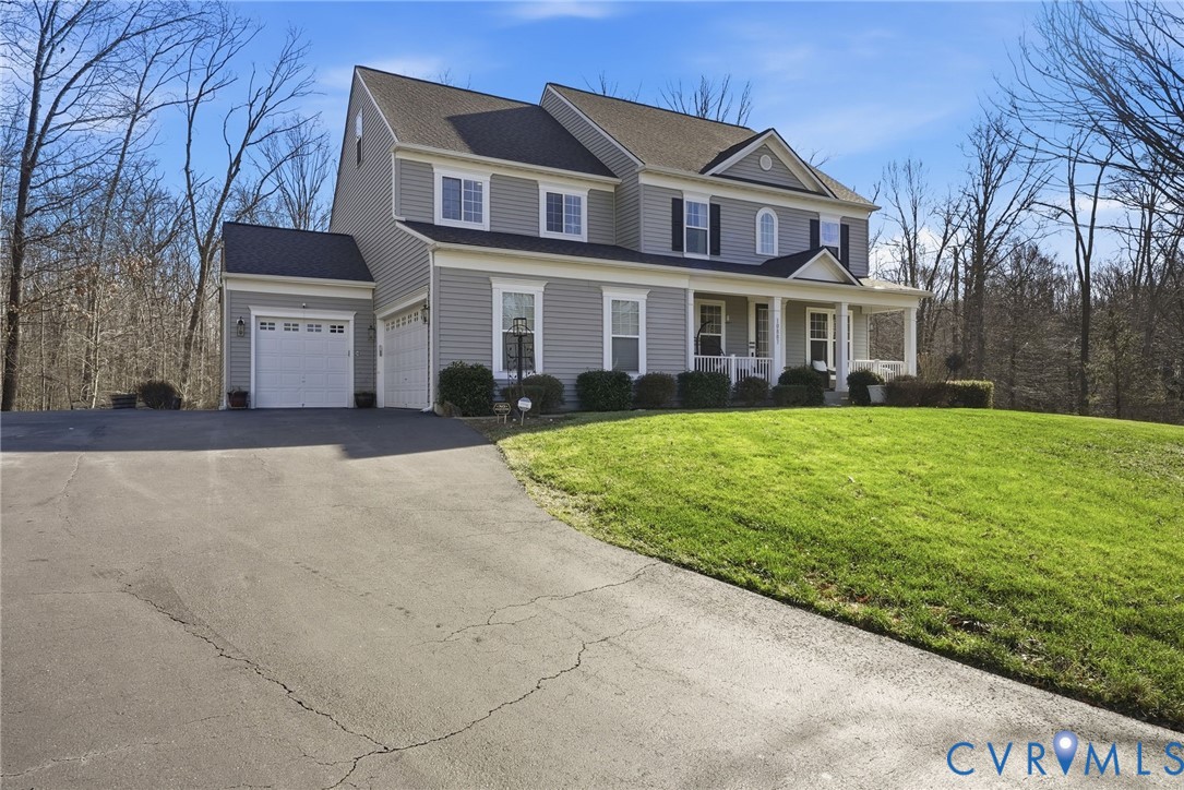10887 Monocacy Way Manassas, VA 20112 - Photo 1 of 48 View of front of home with asphalt driveway, large