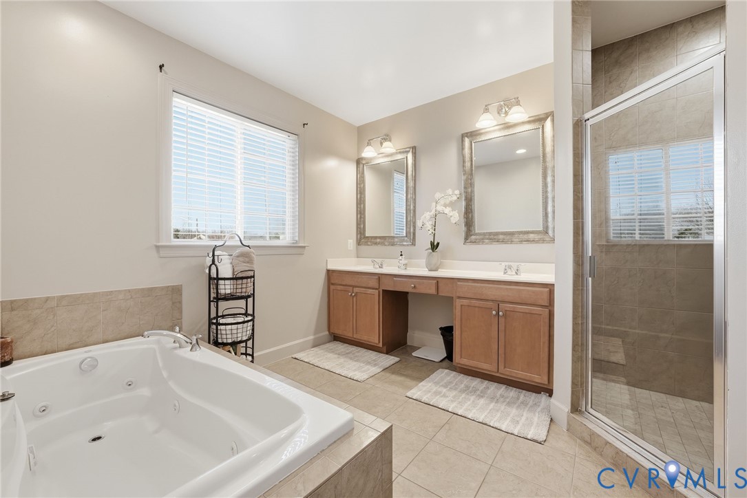 10887 Monocacy Way Manassas, VA 20112 - Photo 24 of 48 Primary Bathroom featuring double vanity, light ti