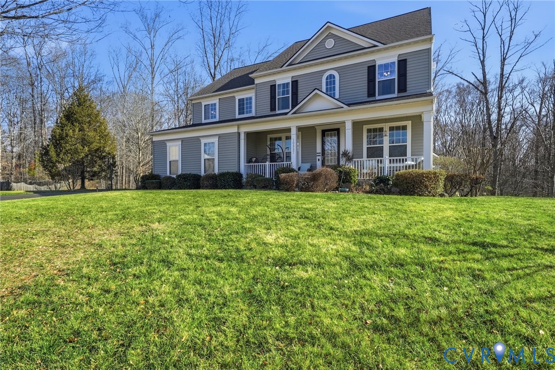 10887 Monocacy Way Manassas, VA 20112 - Photo 3 of 48 View of front of home with asphalt driveway, large