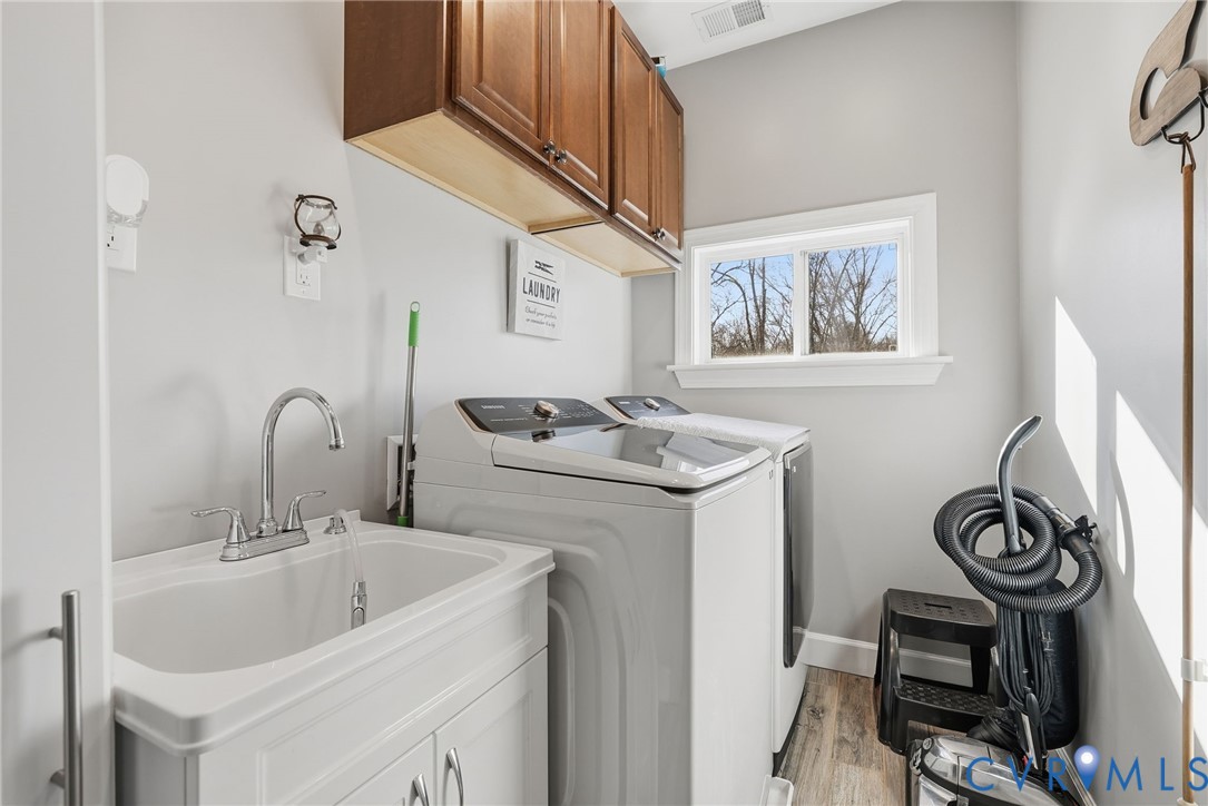 10887 Monocacy Way Manassas, VA 20112 - Photo 33 of 48 2nd Level - Washroom featuring cabinet space, sepa
