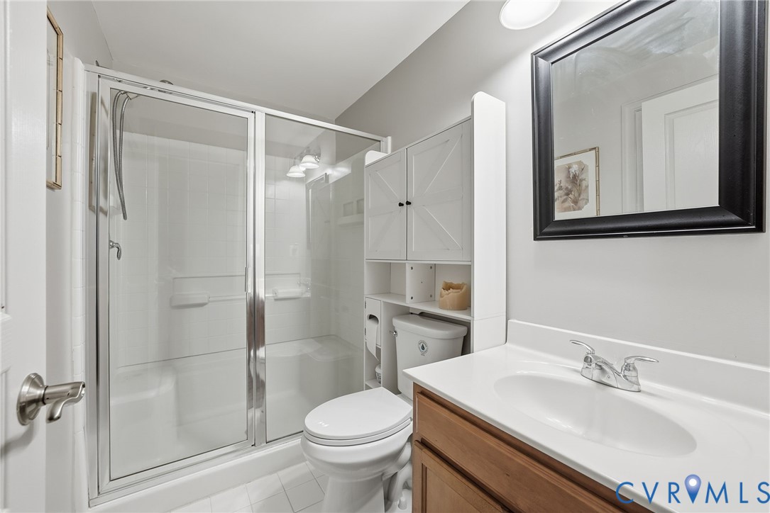 10887 Monocacy Way Manassas, VA 20112 - Photo 40 of 48 Basement - Bathroom with a stall shower, vanity, a