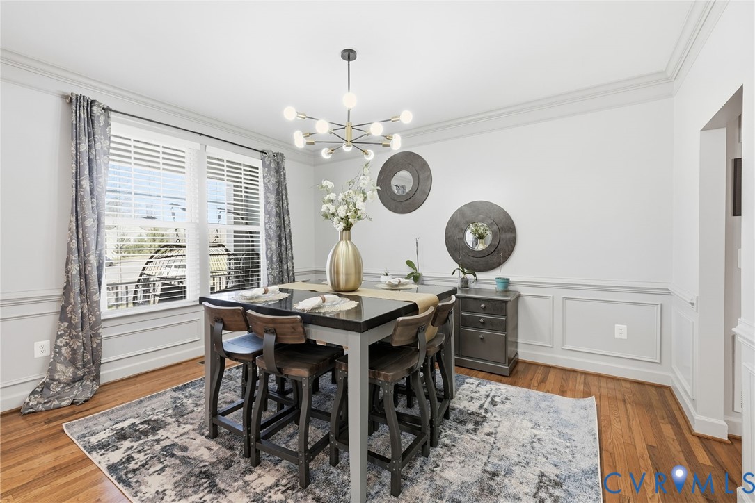 10887 Monocacy Way Manassas, VA 20112 - Photo 5 of 48 Dining space featuring a decorative crown molding,