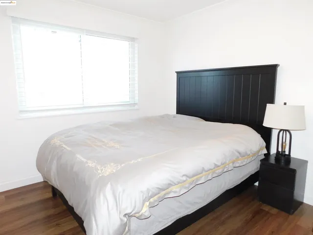 a room with furniture and a window