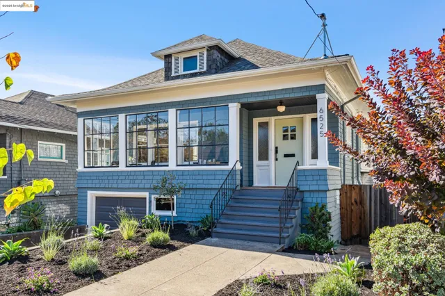 a front view of a house with a porch